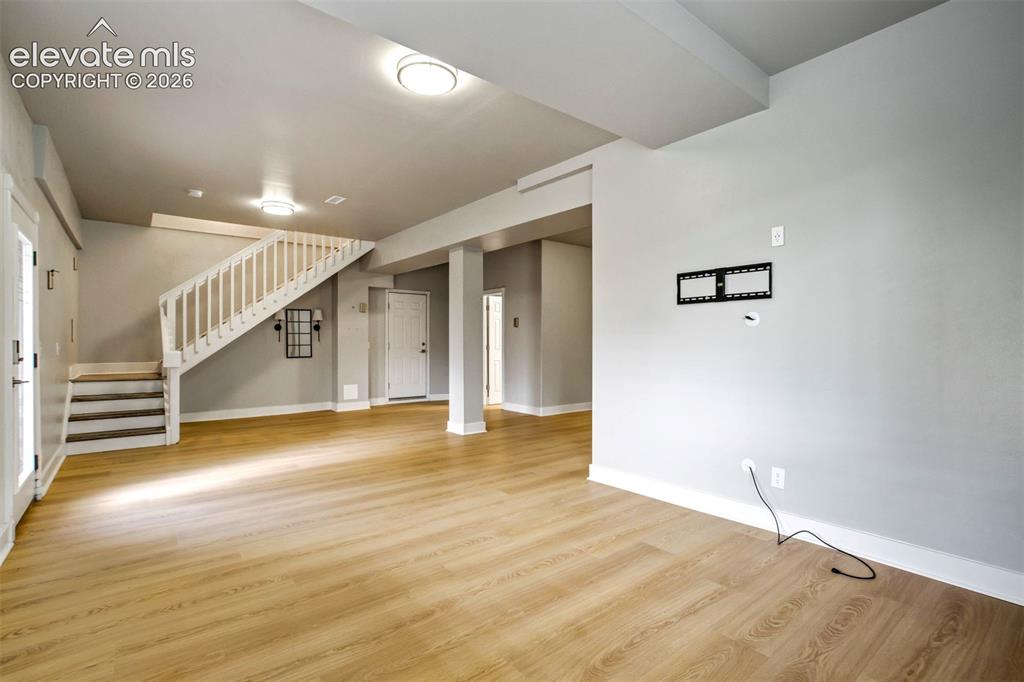Image 32 of 48: Walkout basement family room