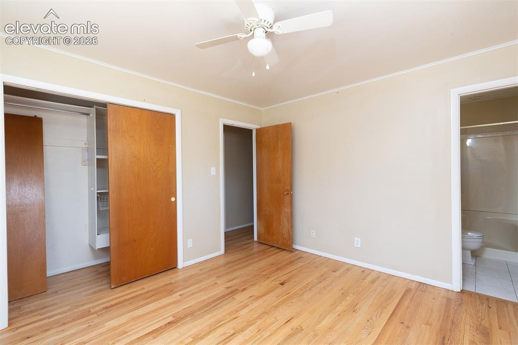 Image 18 of 37: Hardwood Flooring - Attached 3/4 Bathroom