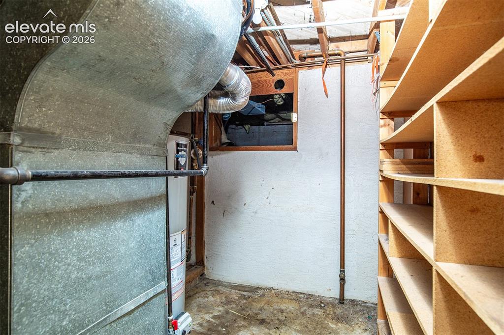 Image 26 of 37: Mechanical Room, Shelving, Crawl Space Access