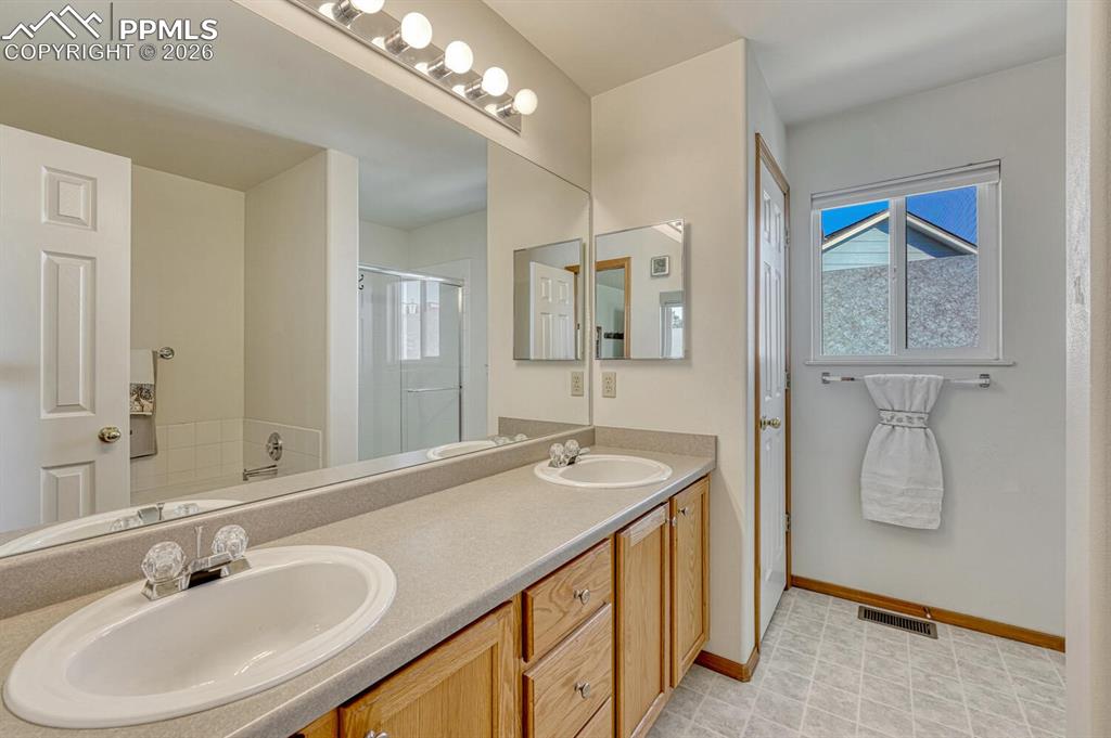 Image 19 of 36: Primary Bathroom