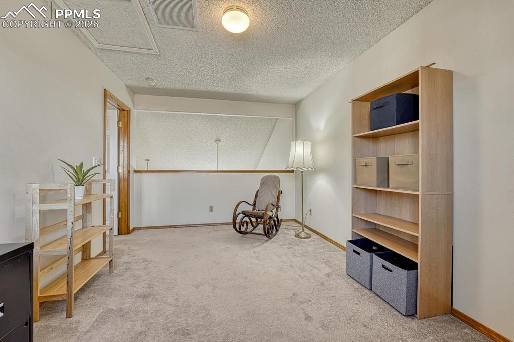 Image 20 of 36: Sitting Room attached to Primary Bedroom