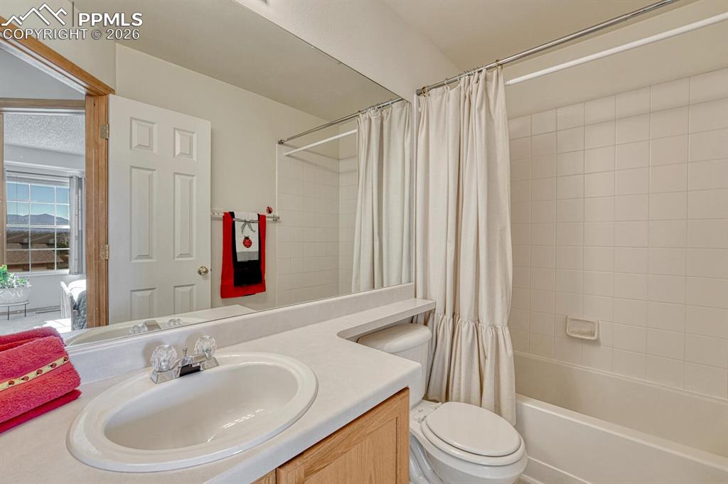 Image 22 of 36: Upper level Guest Bathroom