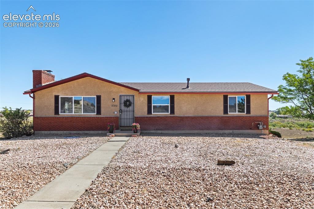 Caption: On 1.38 acres with open space behind the property, this home has fresh exterior paint, new shutters,