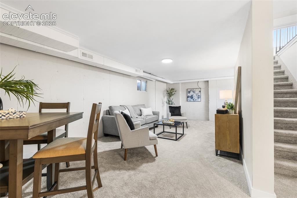 Image 27 of 44: Room to grow in this finished walk out basement with new carpet, paint and 