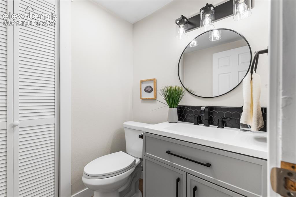 Image 34 of 44: New vanity, fixtures, flooring and paint in this bathroom.
