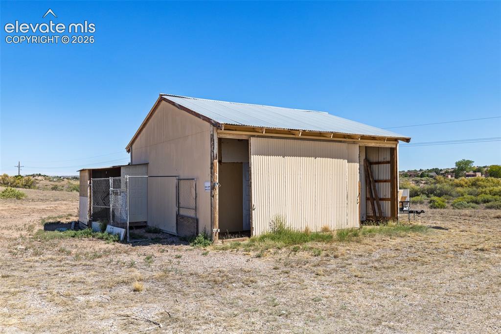 Image 38 of 44: Electric has been added to this outbuilding on a concrete slab