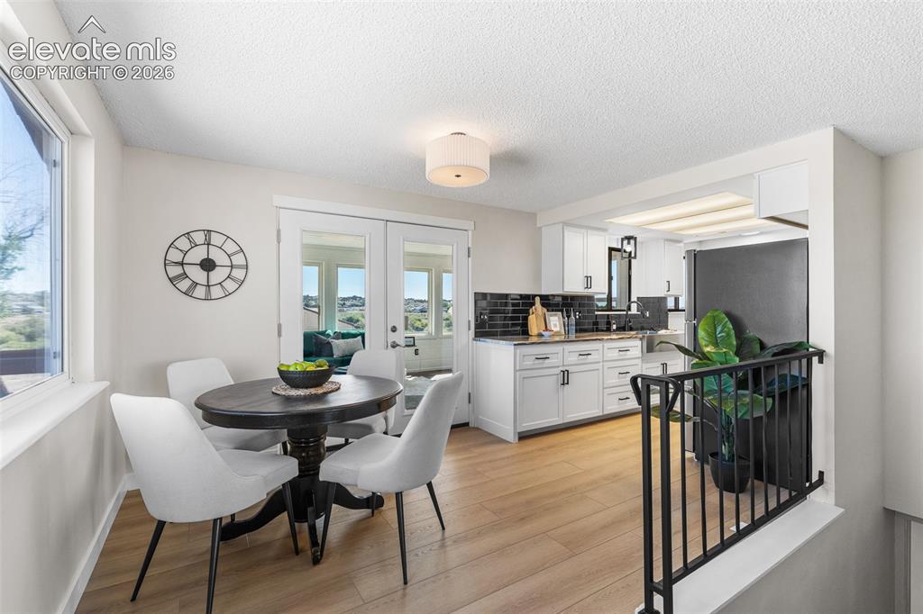 Image 8 of 44: This open floor plan and lots of windows allows this 1200 sq ft rancher fee