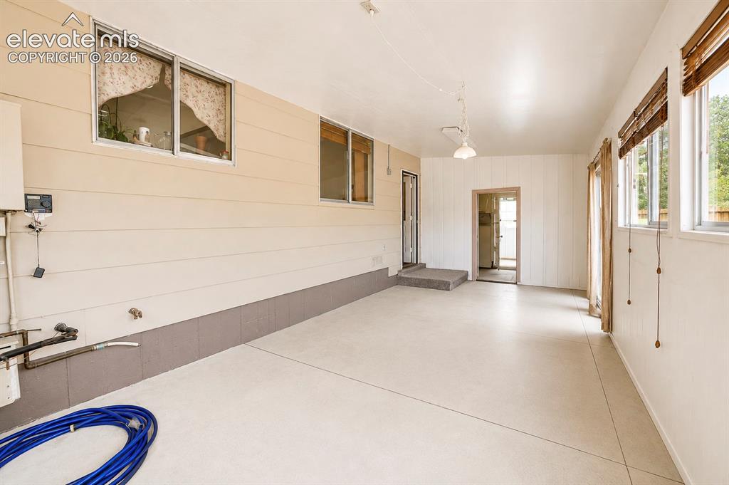 Image 15 of 39: Enclosed Porch