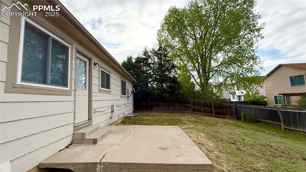 Image 16 of 16: Fenced yard!