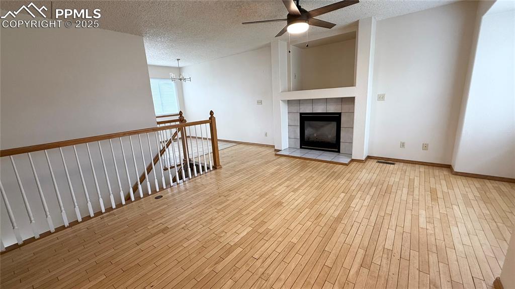 Image 2 of 16: with gas log fireplace