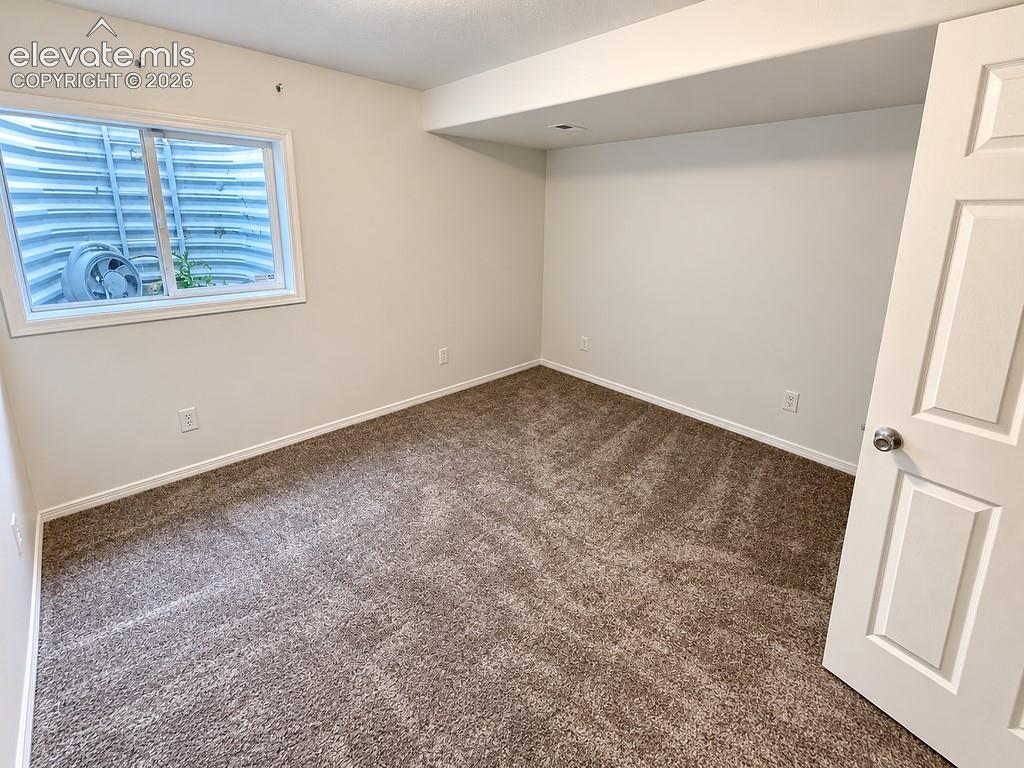 Image 23 of 32: Basement Bedroom 1