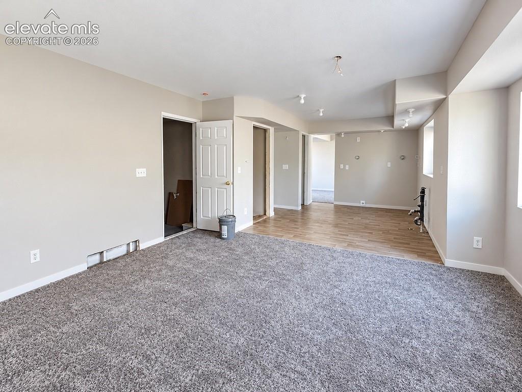 Image 8 of 32: Living Room and Kitchen