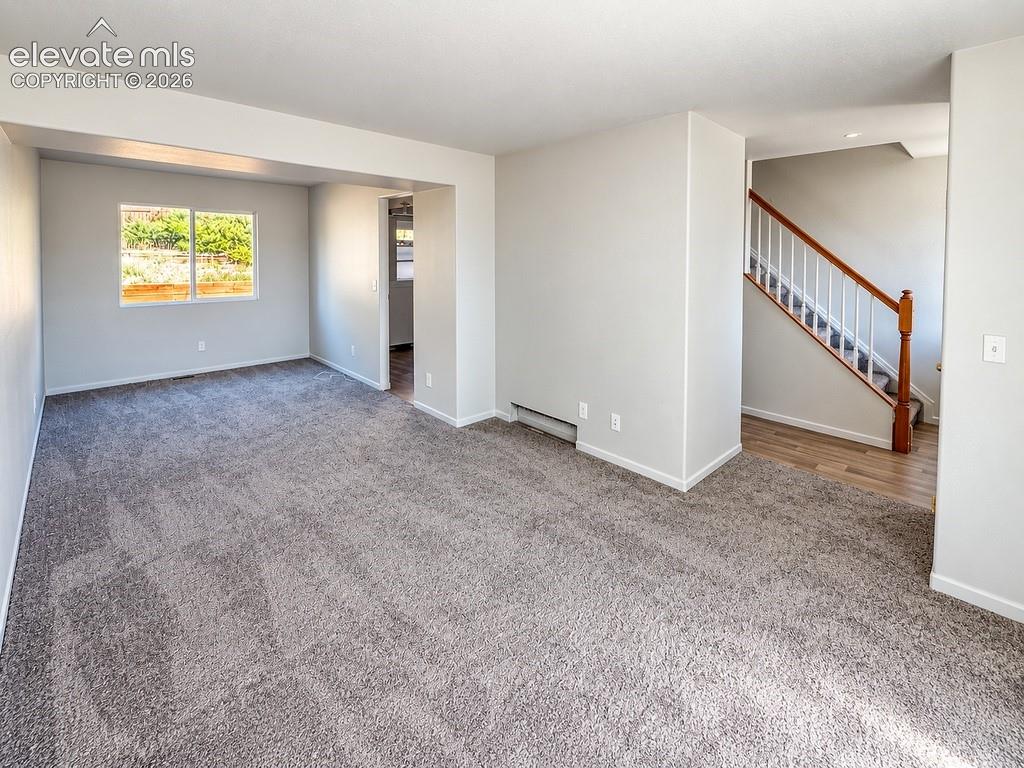 Image 9 of 32: 2nd Living Room and Dining Room