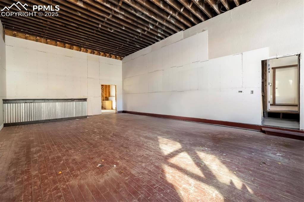 Image 21 of 43: Unit 310 - virtually altered to show space emptied