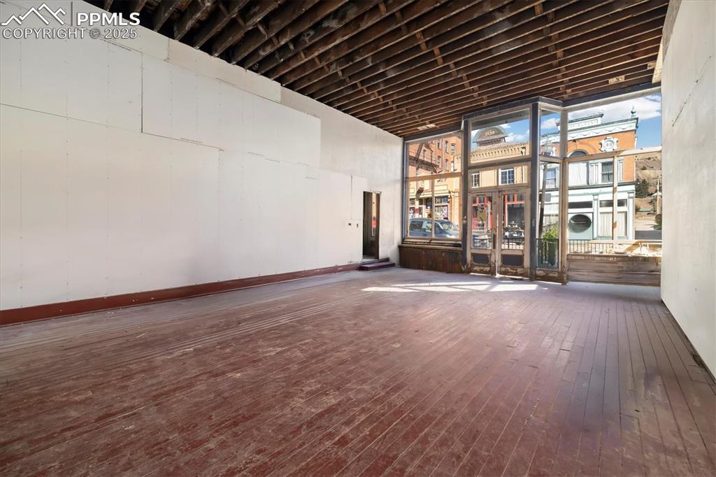 Image 23 of 43: Unit 310 - virtually altered to show space emptied