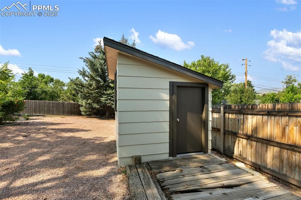 Image 49 of 49: RV parking area and shed