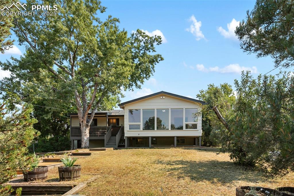 Image 5 of 49: Huge, southwest facing sunroom