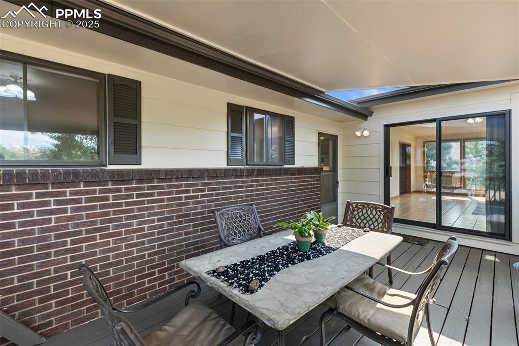 Image 9 of 49: Table and chairs stay with the home