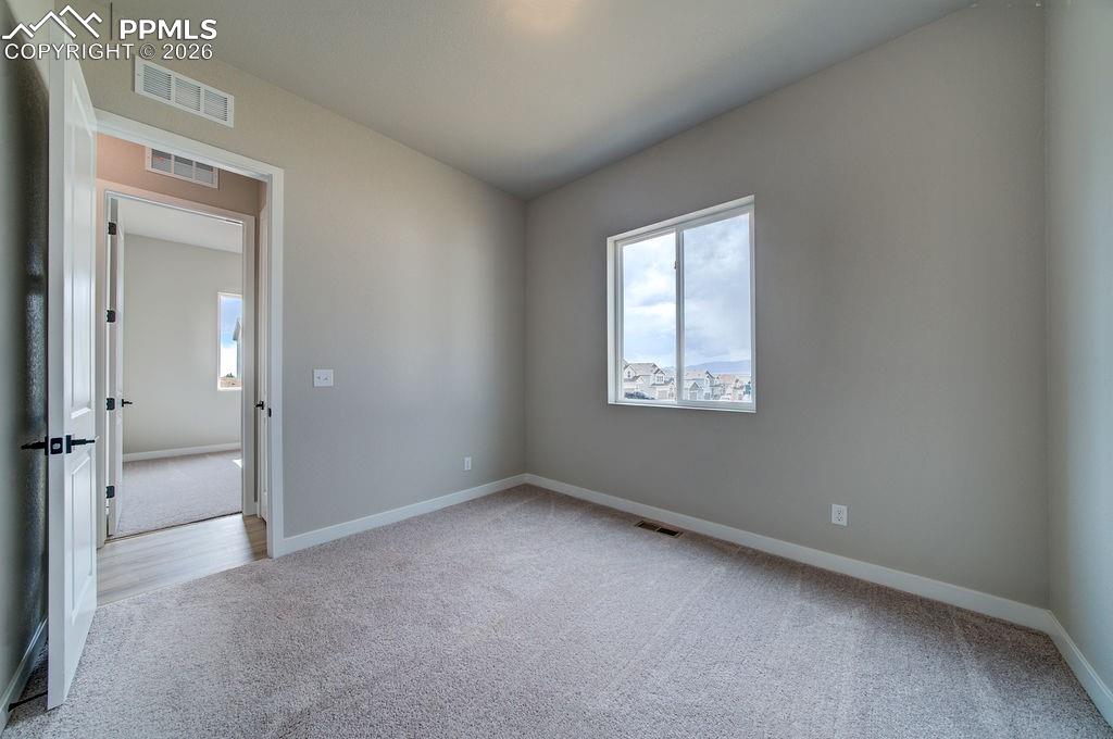 Image 32 of 37: Bedroom