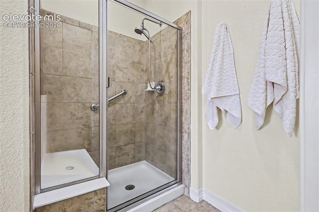 Image 14 of 44: Dual sinks await in your primary suite