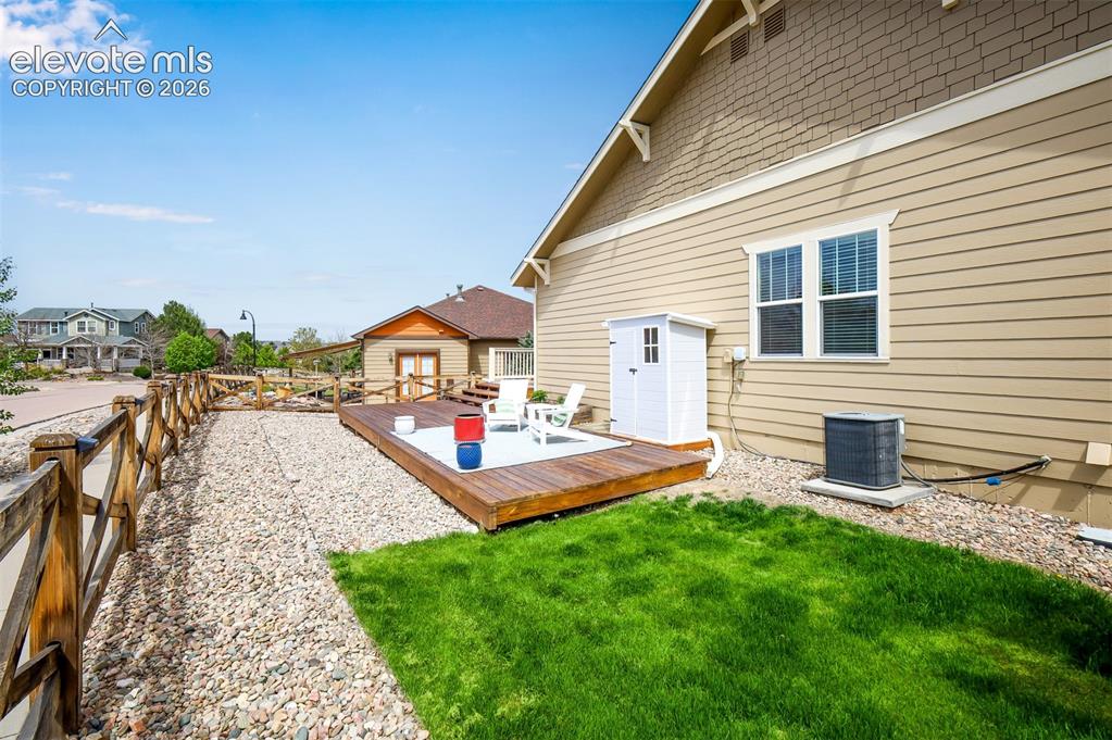 Image 29 of 44: Two decks provide plenty of outdoor entertaining space