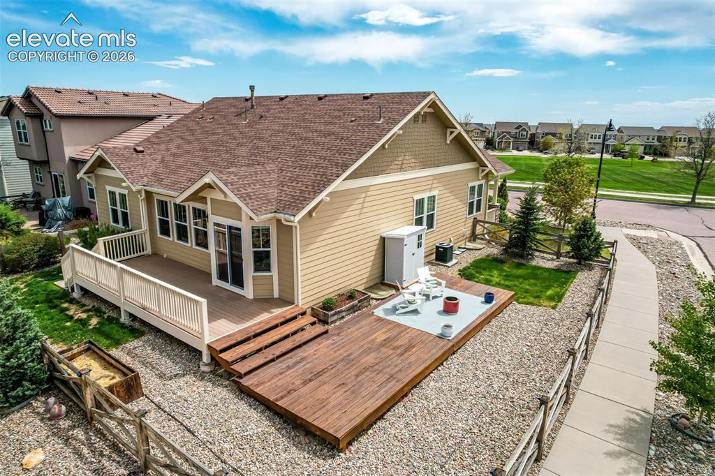Image 30 of 44: Side yard has unobstructed views of Pikes Peak