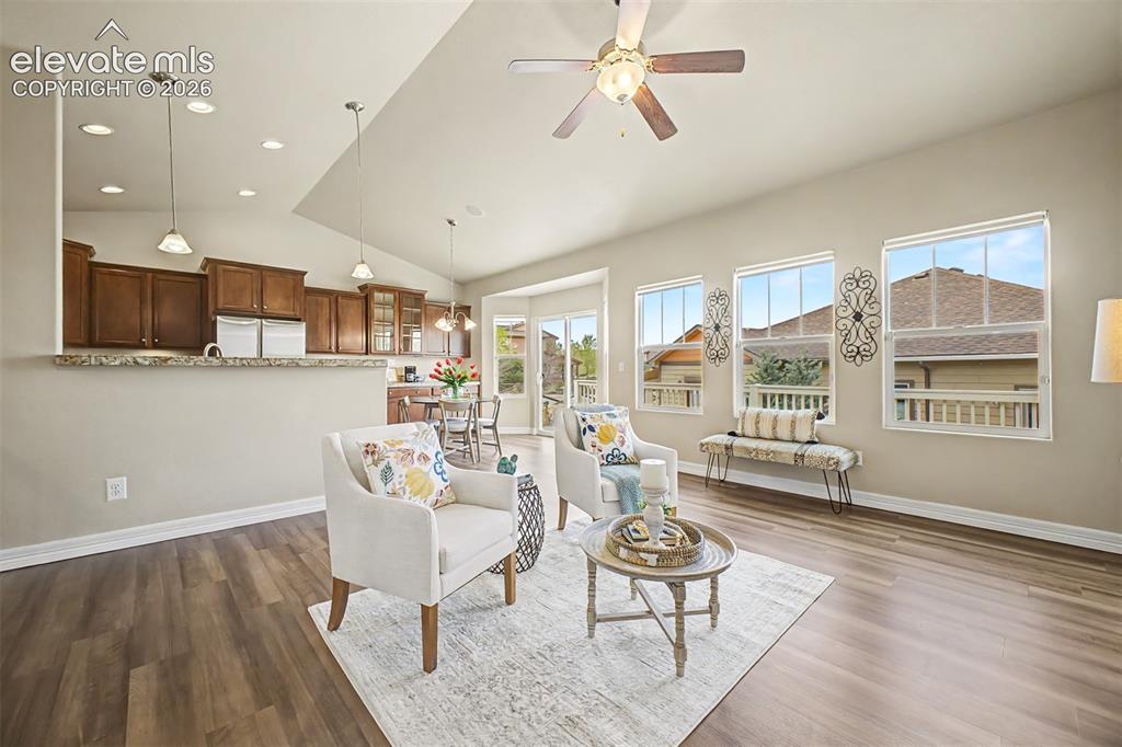 Image 5 of 44: Open floor plan connects living room, kitchen and dining area