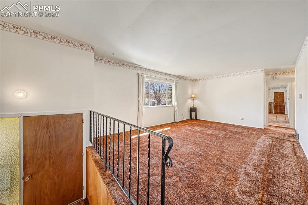 Image 6 of 45: Living Room From Top Of Stairs