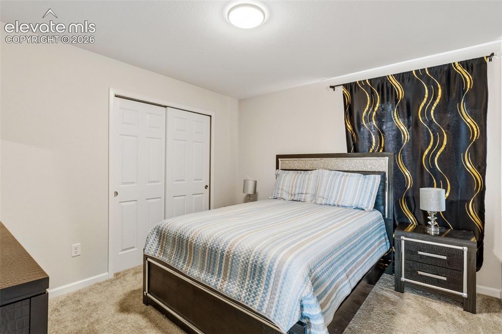 Image 21 of 28: Bedroom