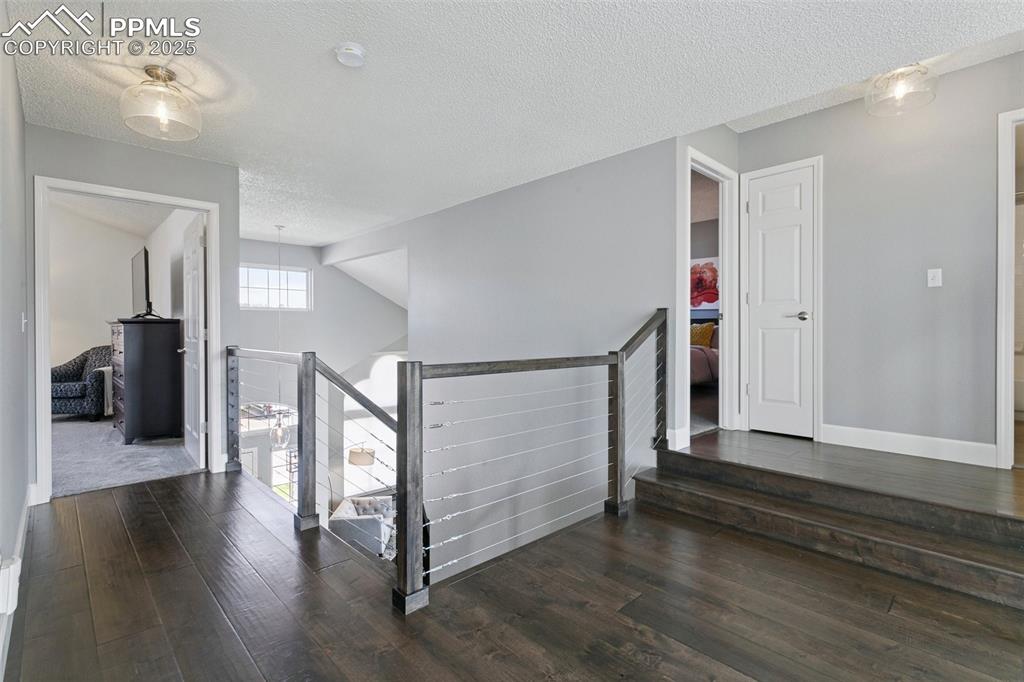 Image 29 of 50: Another view of the upper-level landing