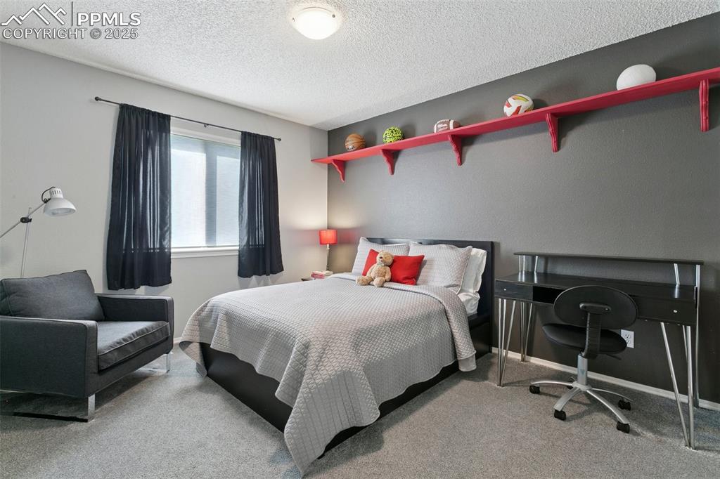 Image 38 of 50: Upper level bedroom