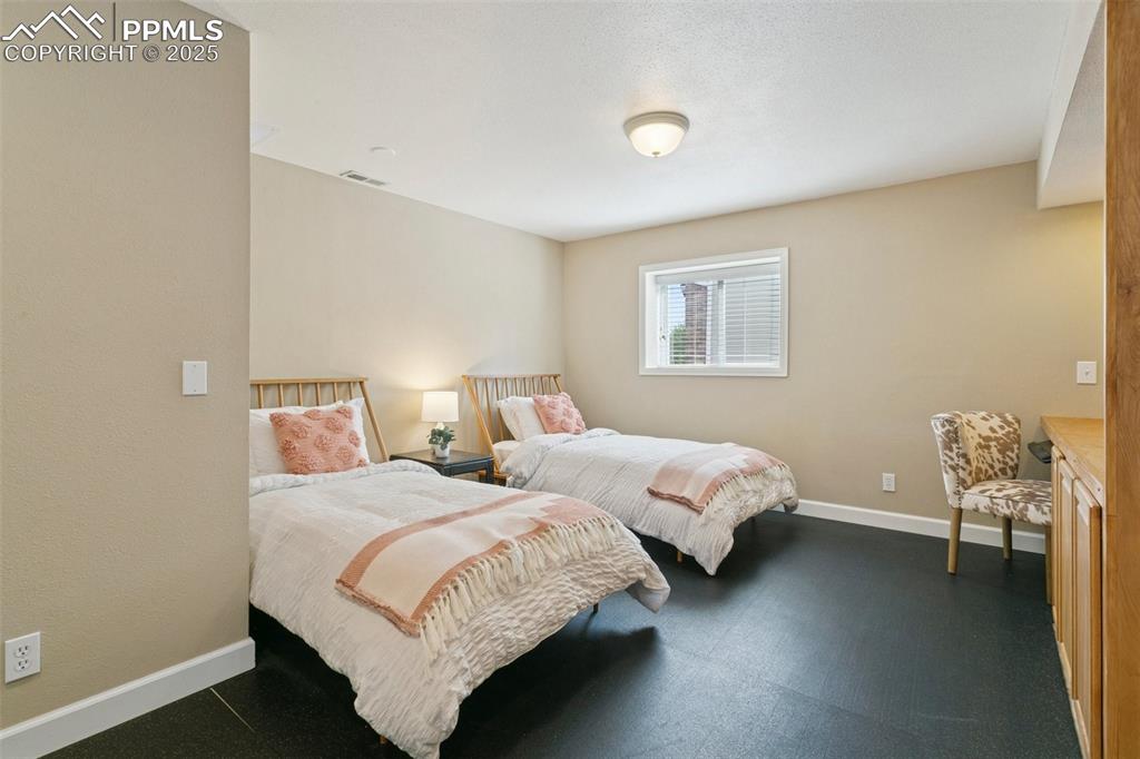 Image 43 of 50: Flex space in the basement! Perfect workout area or second home office!