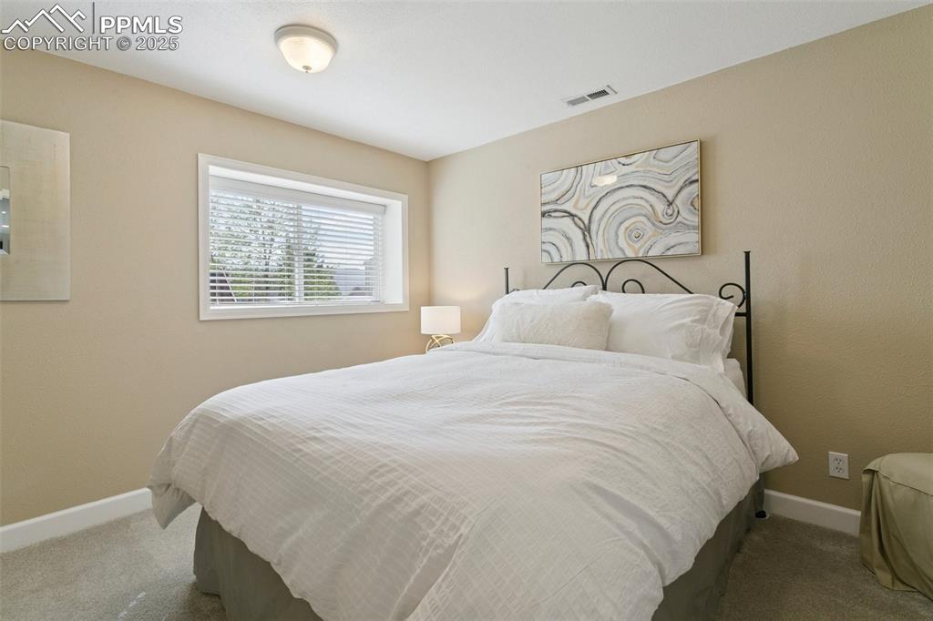 Image 45 of 50: Garden-level bedroom w/walk-in closet!