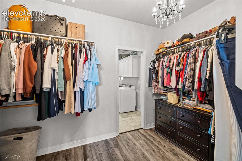Image 13 of 24: Primary Bedroom Walk in Closet