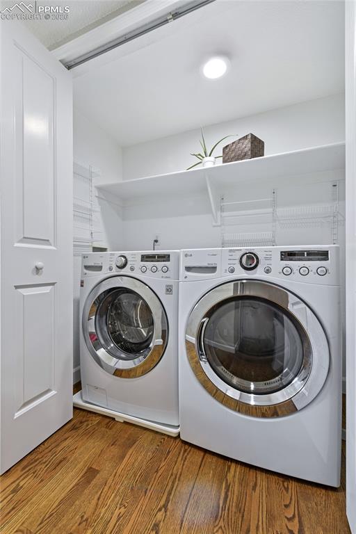 Image 12 of 46: Dedicated laundry space includes washer and dryer