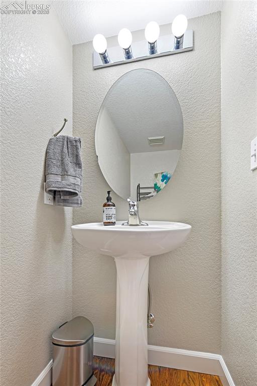 Image 13 of 46: Main-level powder room
