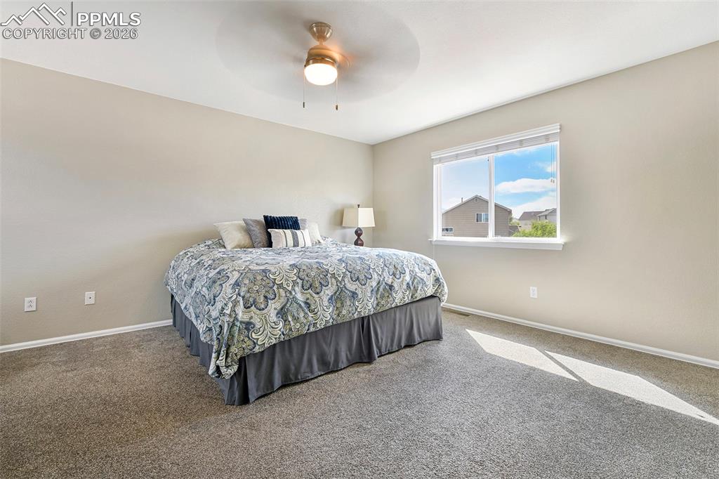Image 14 of 46: Expansive primary retreat