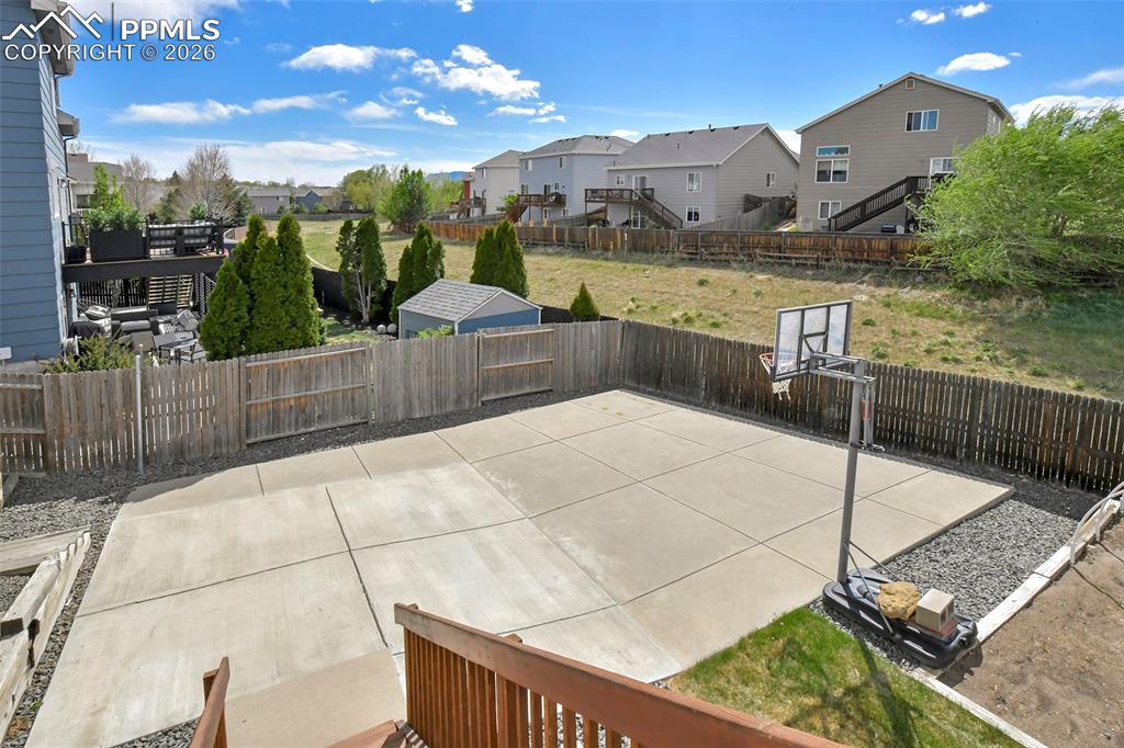 Image 33 of 46: Court backs to open space with no rear neighbors