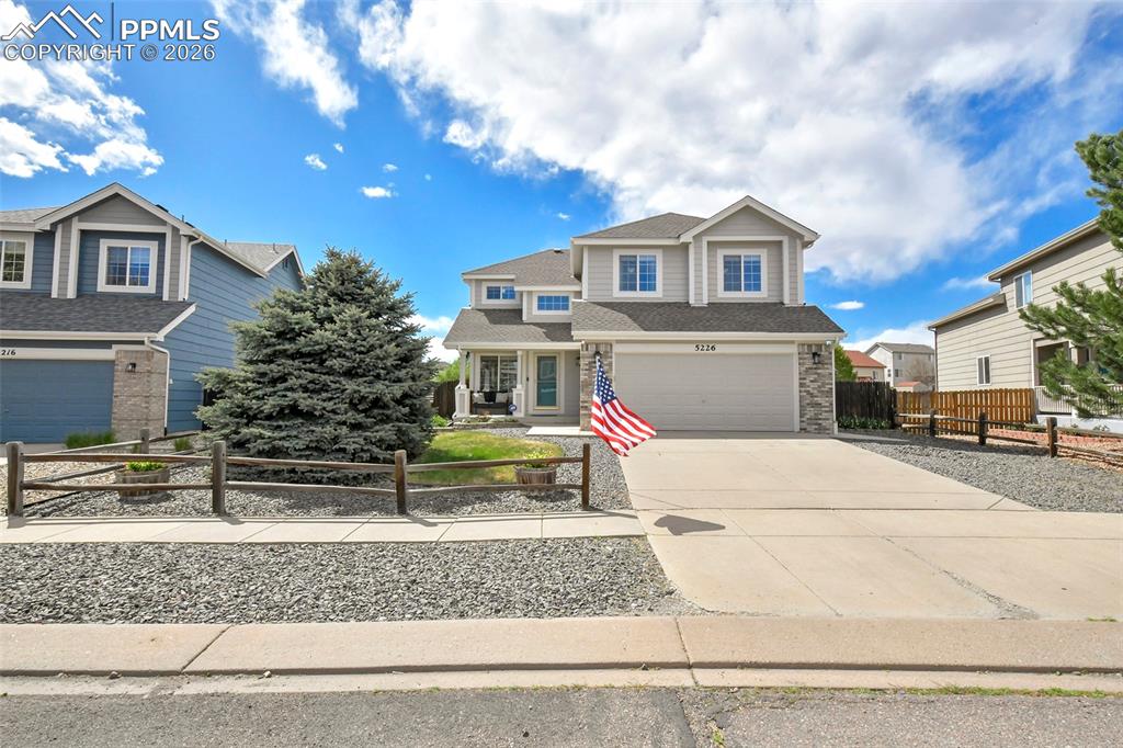 Image 46 of 46: Impressive front elevation with welcoming entry