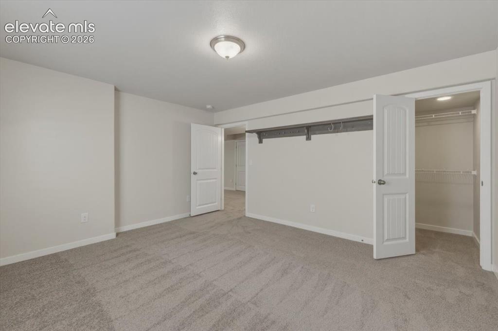Image 40 of 50: Bedroom with walk in closet.