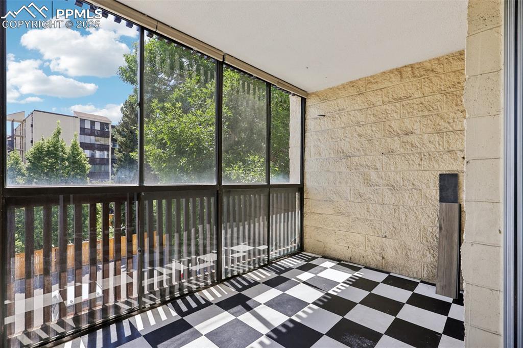 Image 24 of 25: Unfurnished sunroom with healthy amount of natural light
