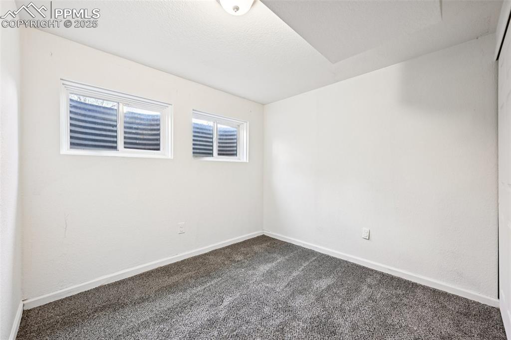 Image 28 of 33: Bedroom