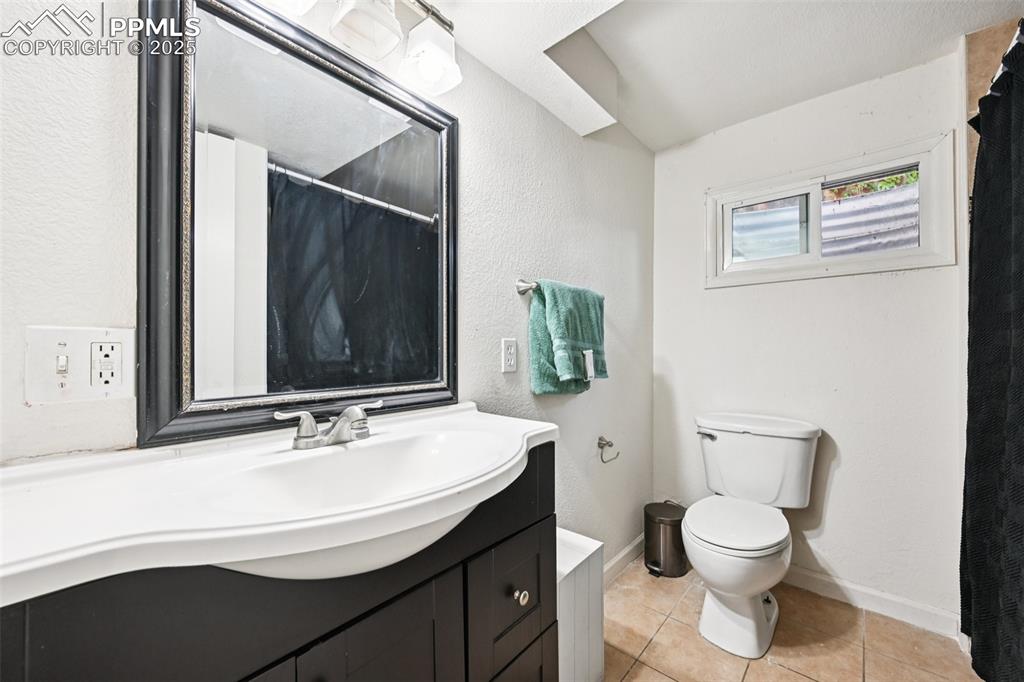 Image 29 of 33: Basement Bathroom