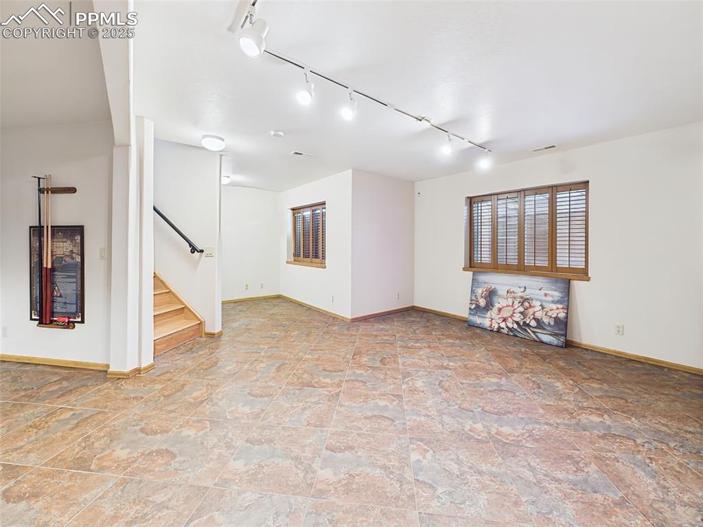 Image 34 of 50: Check out that corner nook that would be perfect for a desk or reading area