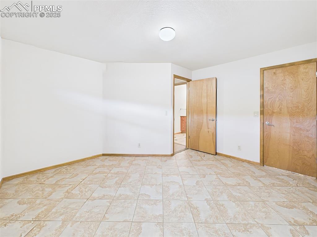 Image 42 of 50: Bedroom #2 has immediate access to 3/4 bathroom!
