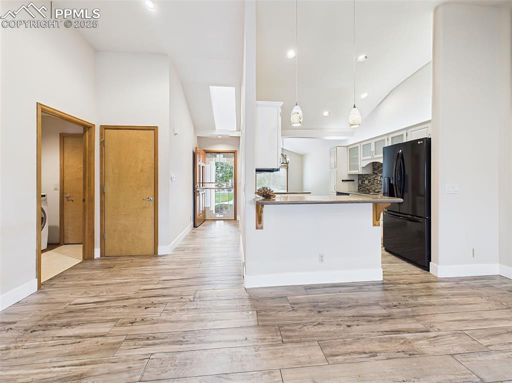 Image 5 of 50: View of Entry from porch or garage access via laundry room!