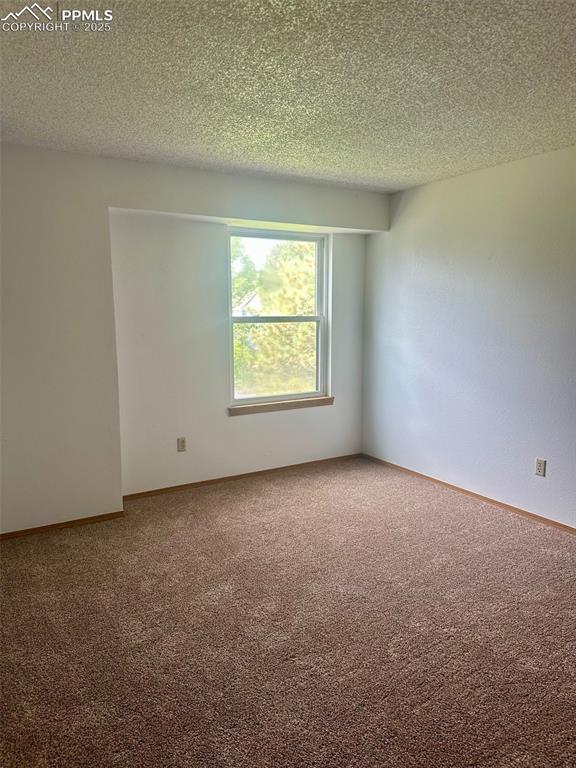 Image 21 of 39: 2nd upper level bedroom.