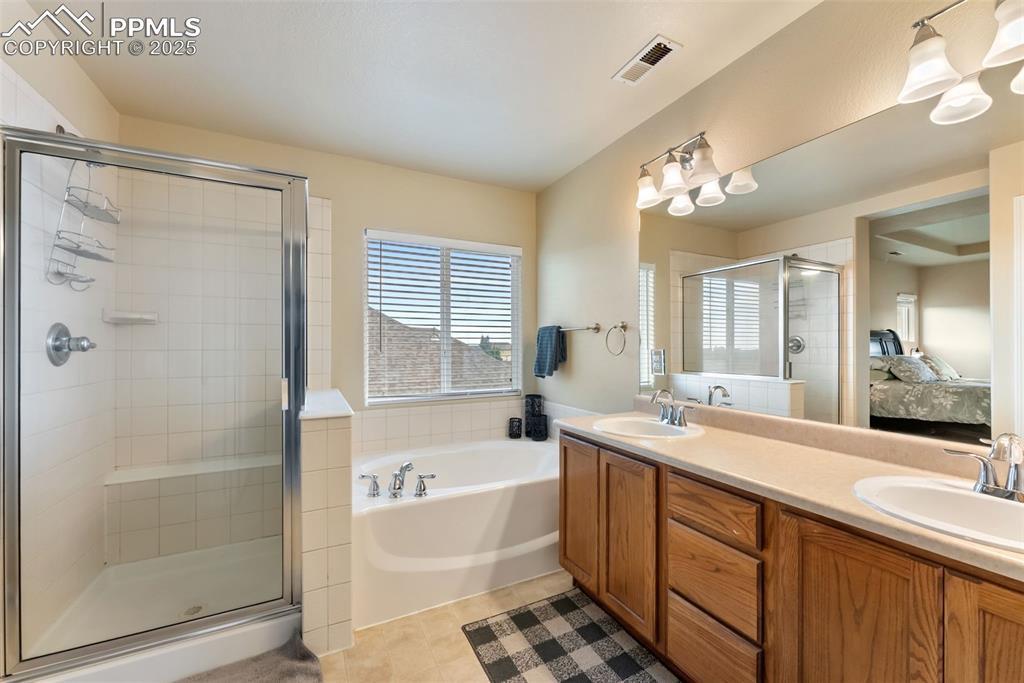 Image 21 of 50: Master Bathroom