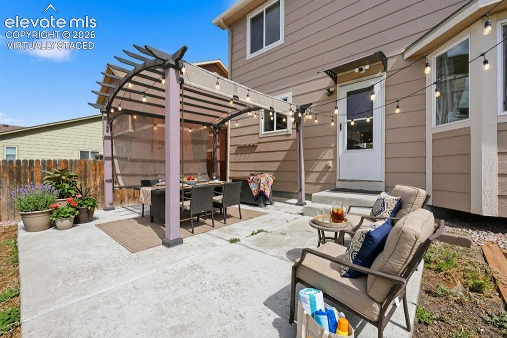 Image 30 of 34: virtually staged backyard