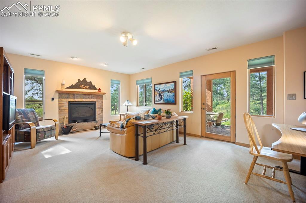 Image 29 of 50: Spacious Family Room with access to Patio